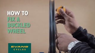 How to fix a buckled wheel [upl. by Lazor]